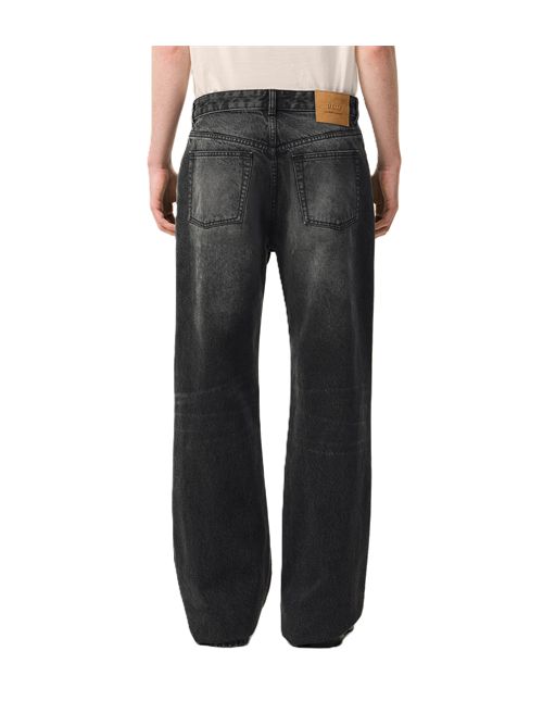 Ami Paris Jeans dal taglio ampio in denim nero effetto used. Ami Paris | HTR450.DE0124031 USED BLACK